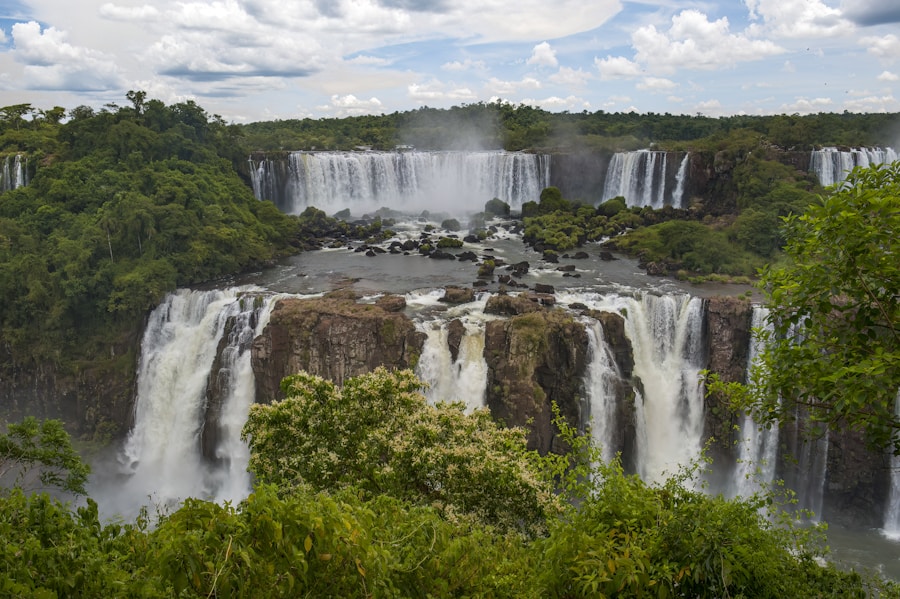 Vast Iguazu cascade framed by emerald rainforest