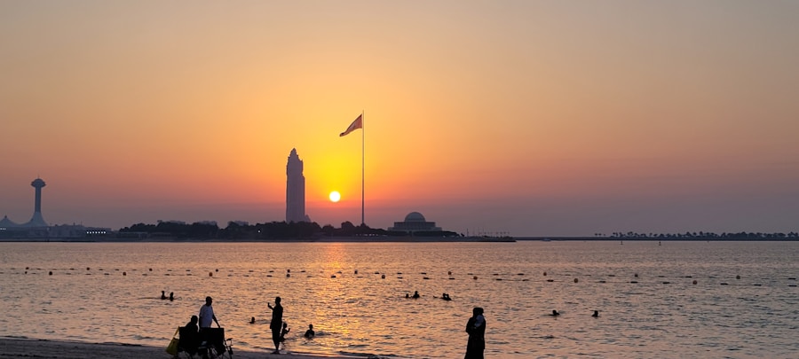 Warm Abu Dhabi Corniche sunset over the calm sea