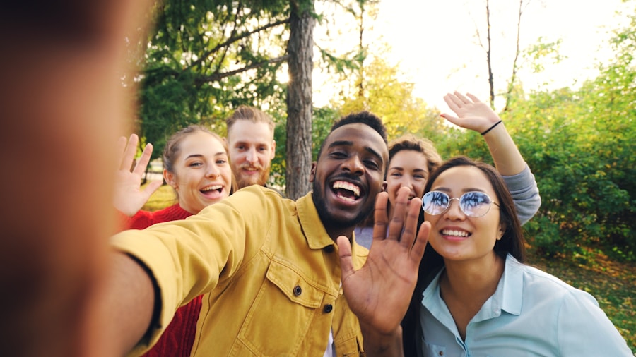 Friends waving and smiling at each other outdoors